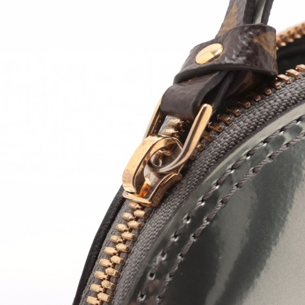 Authentic Louis Vuitton Vernis Alma - Picture 3 of 10